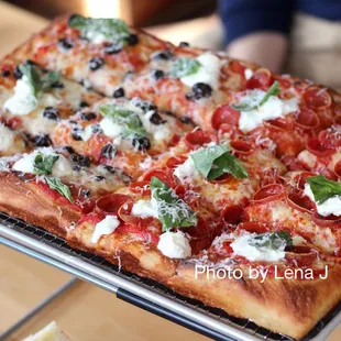 Sicilian Ray J ($38) - subbed pepperoni for olives on 1/2. It&apos;s tasty! The crust is airy, bread-like, a bit crispy on the bottom.