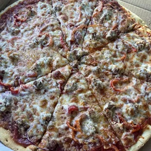 "Supreme Pizza $29 16 inch. Super cracker thin crust.