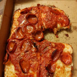 a slice of pepperoni pizza