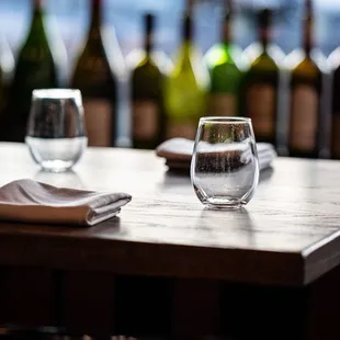 Beautiful wooden table with settings for two.