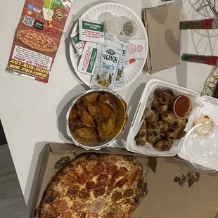 Large pepperoni/Margarita pizza 10 mild wings and an order of garlic knots.