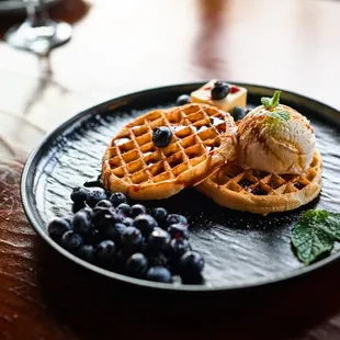 House made waffles, with icecream and fresh blueberries.