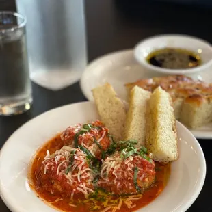 a plate of pasta and bread