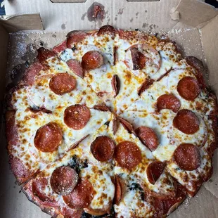 a pepperoni pizza in a box