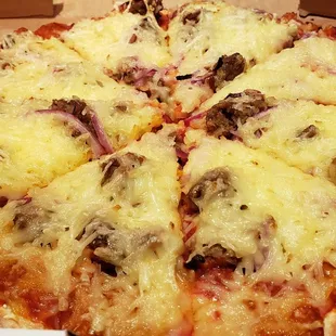 12" "vegan meatza" ($18.50). Good crust, great sauce, decent vegan meats (unsure of brands). But the Daiya cheese sucks &amp; was excessive.