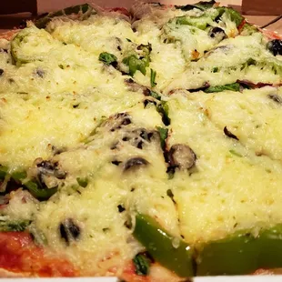 12" veggie pizza w/vegan cheese ($17). Good crust &amp; great sauce. But the Daiya cheese sucks and was excessive.