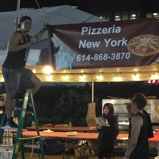 Setting up at the Slice of Columbus benefiting Children's hospital.