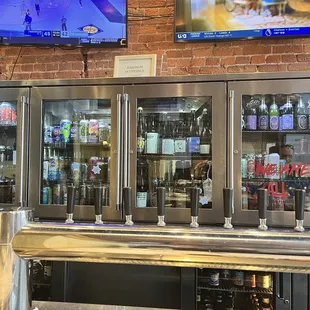 a bar with beer taps