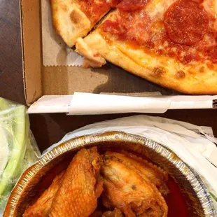 a pizza and chicken wings