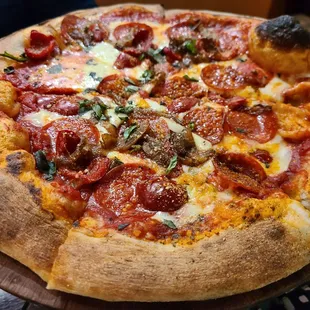 BYO thin crust with peppadew peppers, caramelized onion, and pepperoni