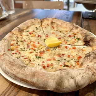 Clam Pie (clams, garlic, provolone, parsley, roasted peppers, lemon)