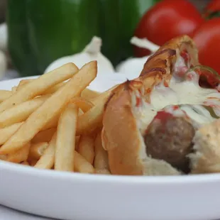 Italian sausage with mozzarella cheese, baked in our pizza oven and served up with the best french fries in town
