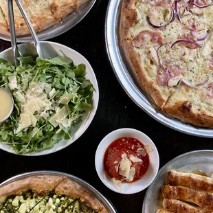 Pesto Flatbread, Cinnamon Sticks, Chef&apos;s Special, Cheesy Flatbread, Arugula Salad