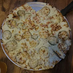 The Dilly Dilly: Garlic cream sauce, house made pickles, mozzarella, and dill ranch dressing.