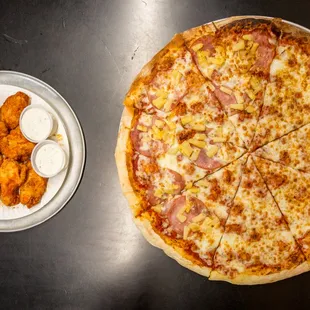a pizza and chicken wings