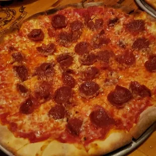 Their pepperoni thin crust pizza ($15) is DELICIOUS. Nice kick from the robust tomato sauce and perfectly cheesy