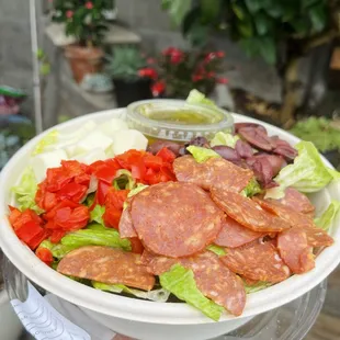 Chop salad - kalamata, roasted peppers, red wine vinaigrette, provolone, pepperoni