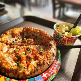 My veggie pizza and cesar salad.