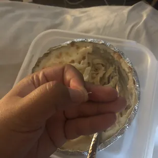 I took a bite, I almost swallowed this plastic. Think it melted from the plastic cover due to the pasta being so hot, some pieces broke off.