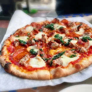 Turf &amp; Turf $20. Tomato sauce, mozzarella, basil, pepperoni and Italian sausage.