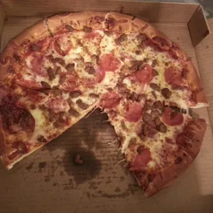 Meat lovers (large) with some slices missing. I&apos;m bad at pictures, okay?