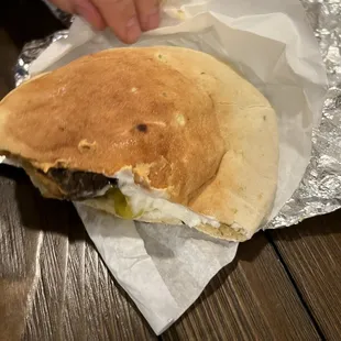 Half of pita is flat.  Means it wasn't stuffed as it should have been.