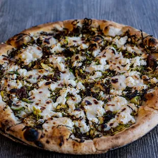 a pizza on a wooden table