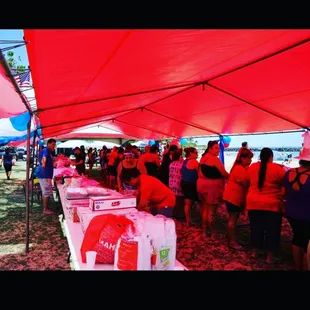 Under Red Tarp Tent