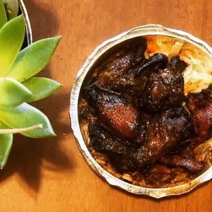 Jerk wings, rice &amp; peas with oxtail gravy, cabbage, plantains