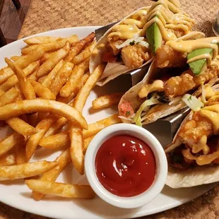 Shrimp tacos and breaded fries.  Really good!