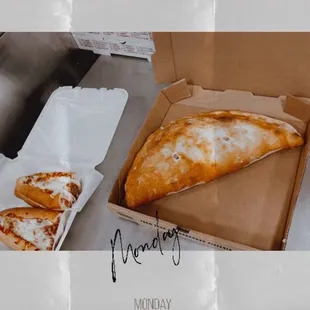 a box of pizza and a box of pizza