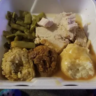 Turkey, dressing, mashed potatoes, green beans and a delicious sweet potato casserole.