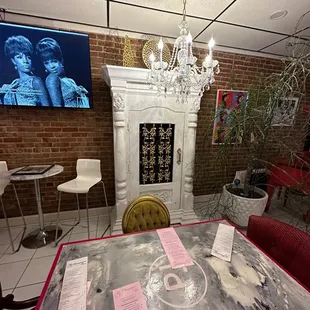 a chandelier and fireplace