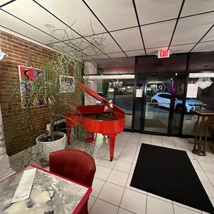 a grand piano in the lobby