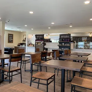 tables and chairs in a coffee shop