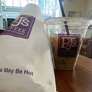 Med iced latte and beignet bag