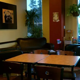 tables and chairs in a coffee shop