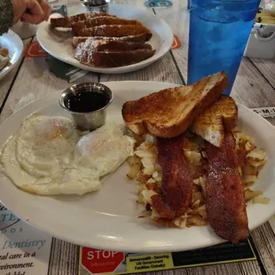 2 eggs over easy, whole wheat toast, hash browns and thick cut bacon.