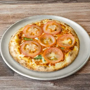 Fresh tomatoes, basil, fire roasted tomato sauce