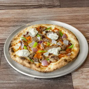 Homemade Australian Lamb, sundried tomatoes, red onions, bell peppers, herbed ricotta