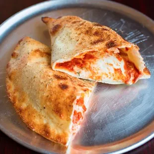 Calzone 8" Build Your Own: thin crust, mozzarella, herbed ricotta, fired roasted tomato sauce