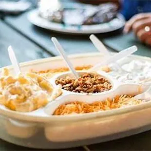 a tray of food on a picnic table