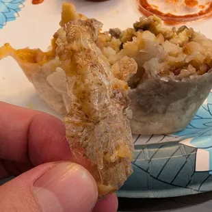 Asada breakfast burrito was great, until I found a piece of plastic.