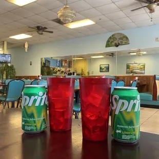 a couple of red cups on a table