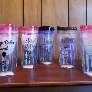 a row of tumblers on a table