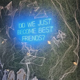 a neon sign that says, did we just become best friends?