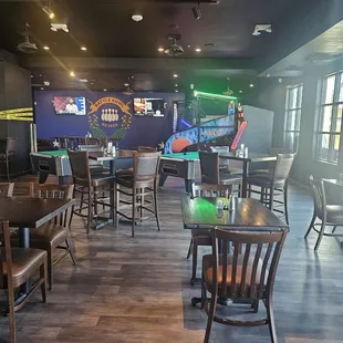 tables, chairs, and a pool table