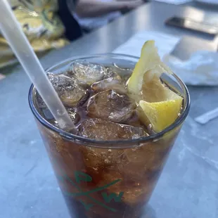 Rum and Coke. Asked for lime got an old lemon.