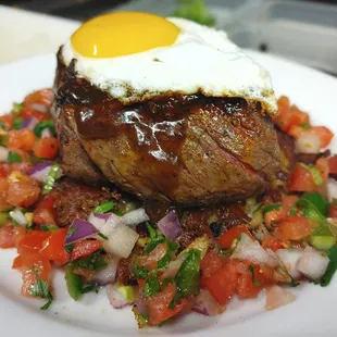 Brazilian steak with pico de gallo and an egg