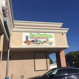 a car parked in front of the store